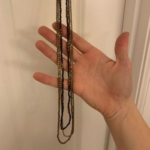 3 strand, long, black and gold necklace